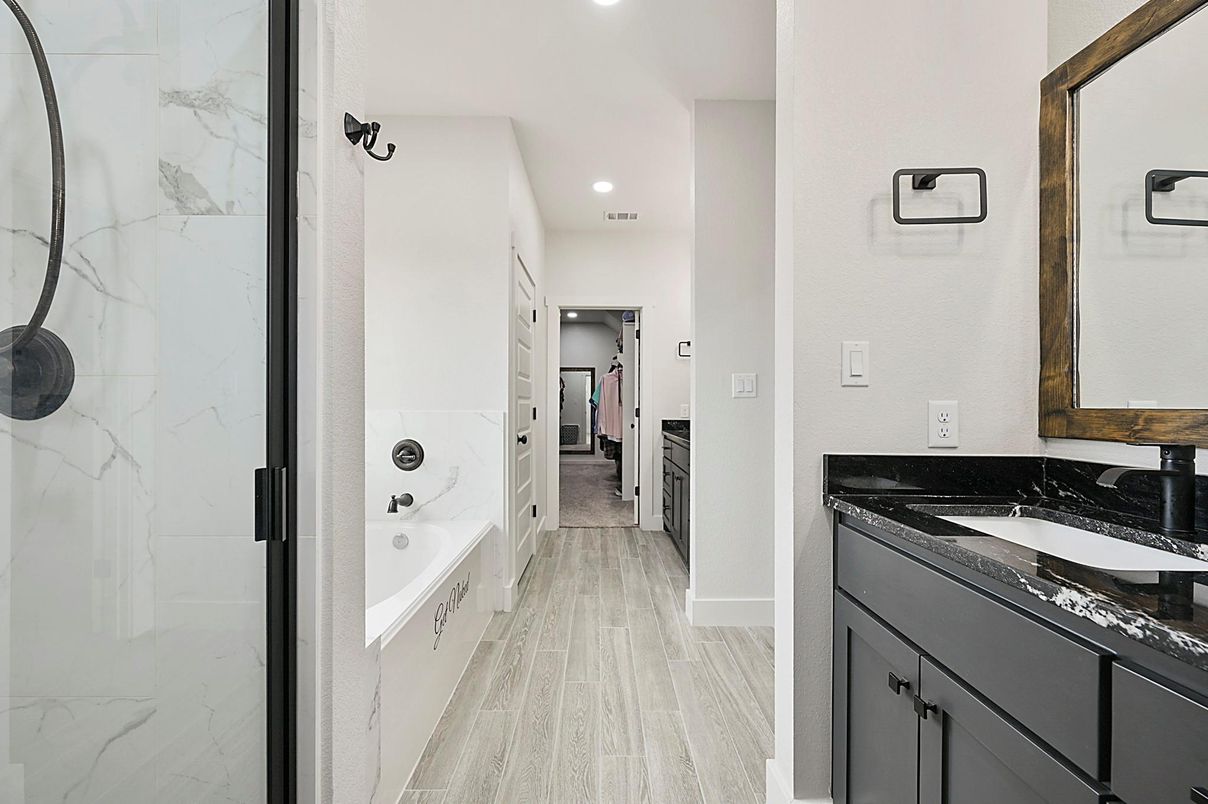 Bathroom, Dual Sink Vanities, Interior, Marble Walls, Recessed Lighting, Wood Texture Flooring