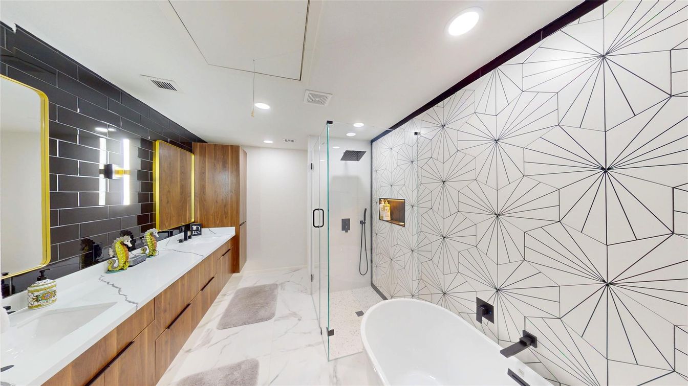 Bathroom, Dual Sink Vanities, Free Standing Baths, Glass Shower, Interior, Marble, Marble Walls, Recessed Lighting
