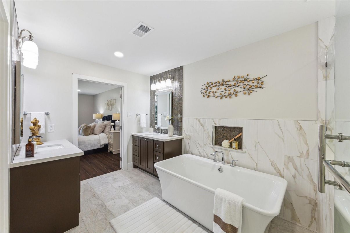 Bathroom, Bedroom, Dual Sink Vanities, Free Standing Baths, Interior, Marble Walls, Recessed Lighting, Wood Texture Flooring