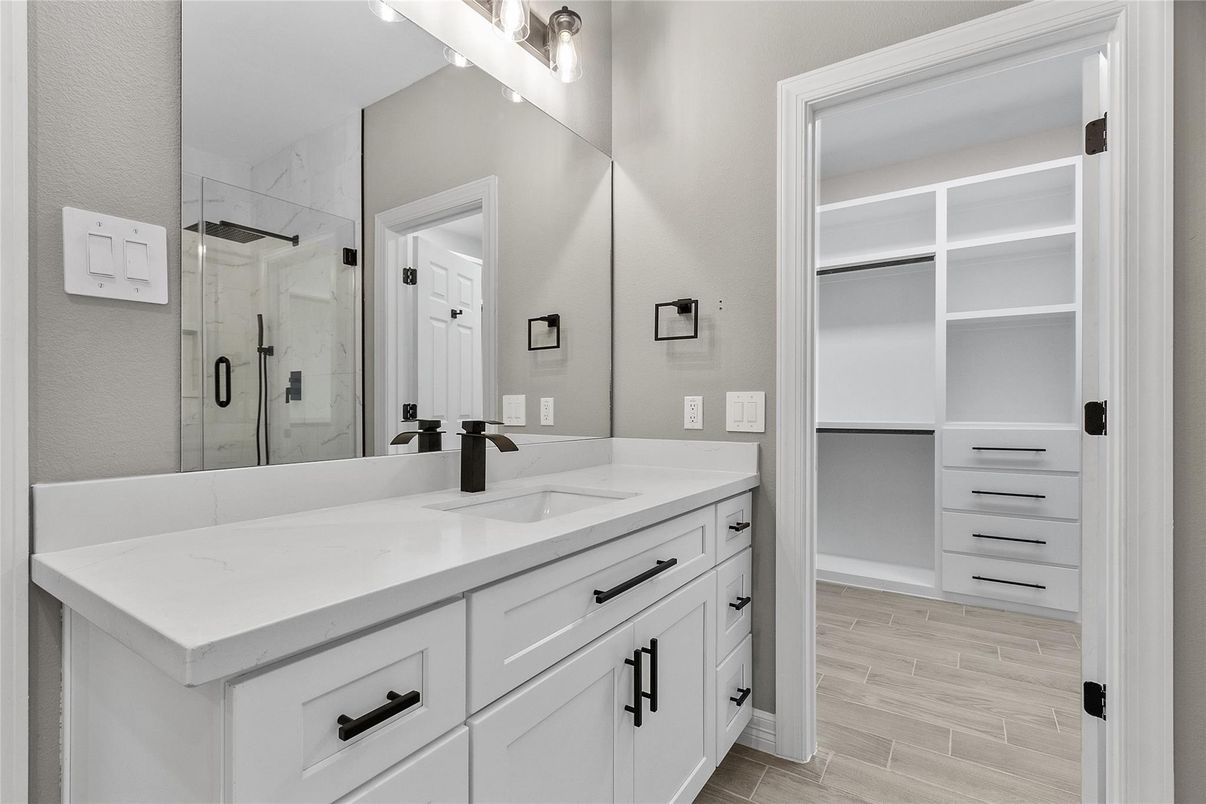 Bathroom, Dual Sink Vanities, Glass Shower, Interior, Walk-in Closets, Wood Texture Flooring