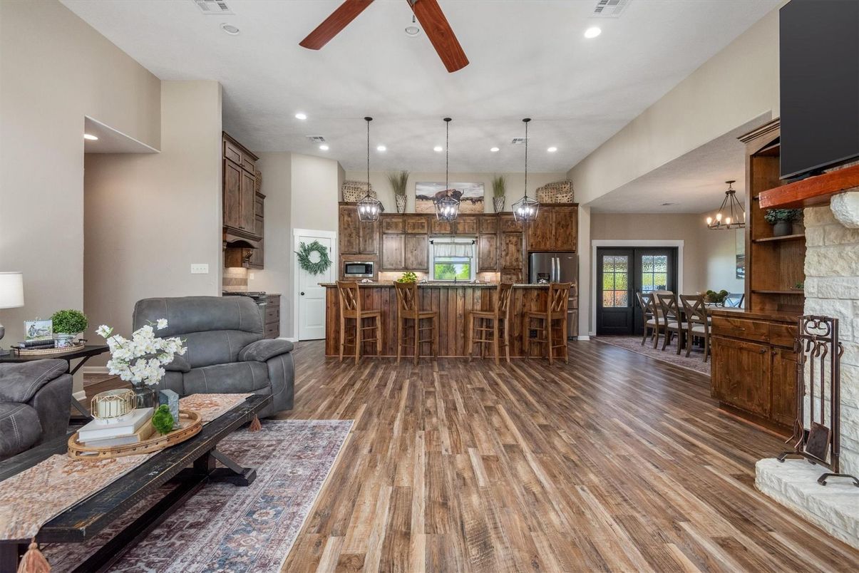 Chandelier, Dining room, Interior, Kitchen, Pendant Lights, Recessed Lighting, Stainless Steel Appliances, Wood Texture Flooring