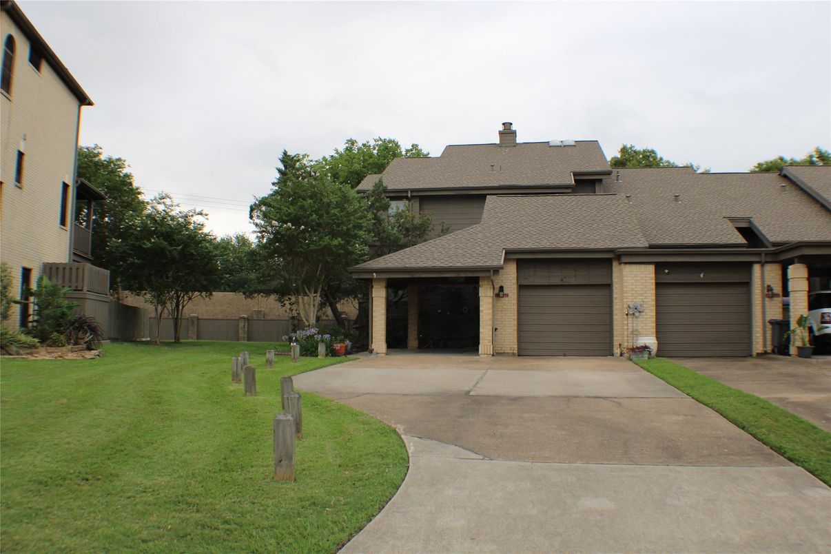 Attached, Backyard, Exterior, Facade, Brick Facade, French Provincial