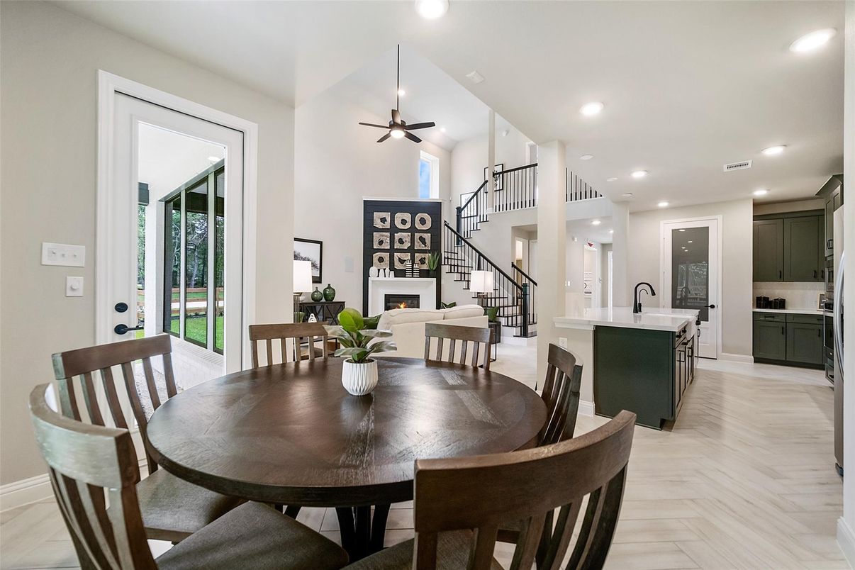 Dining room, Fireplace, Interior, Kitchen, Recessed Lighting, Wood Texture Flooring