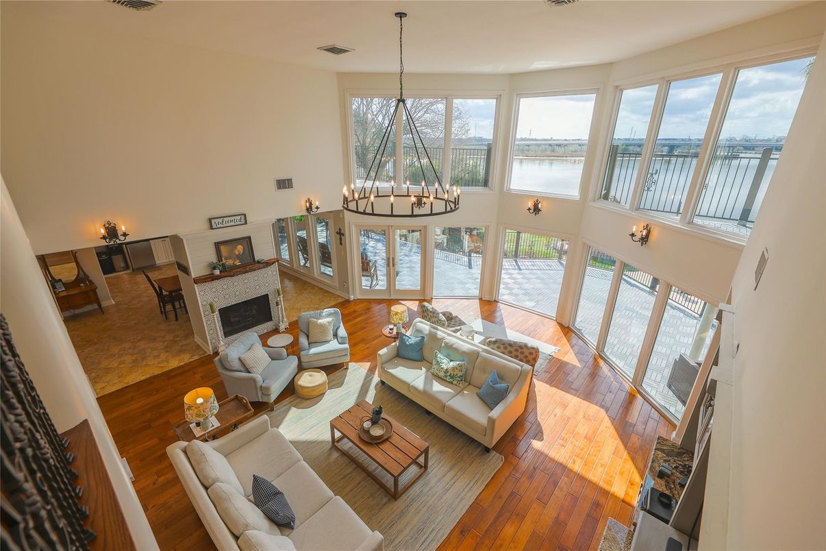 Chandelier, Fireplace, Interior, Living room, Pendant Lights, Water, Wood Texture Flooring