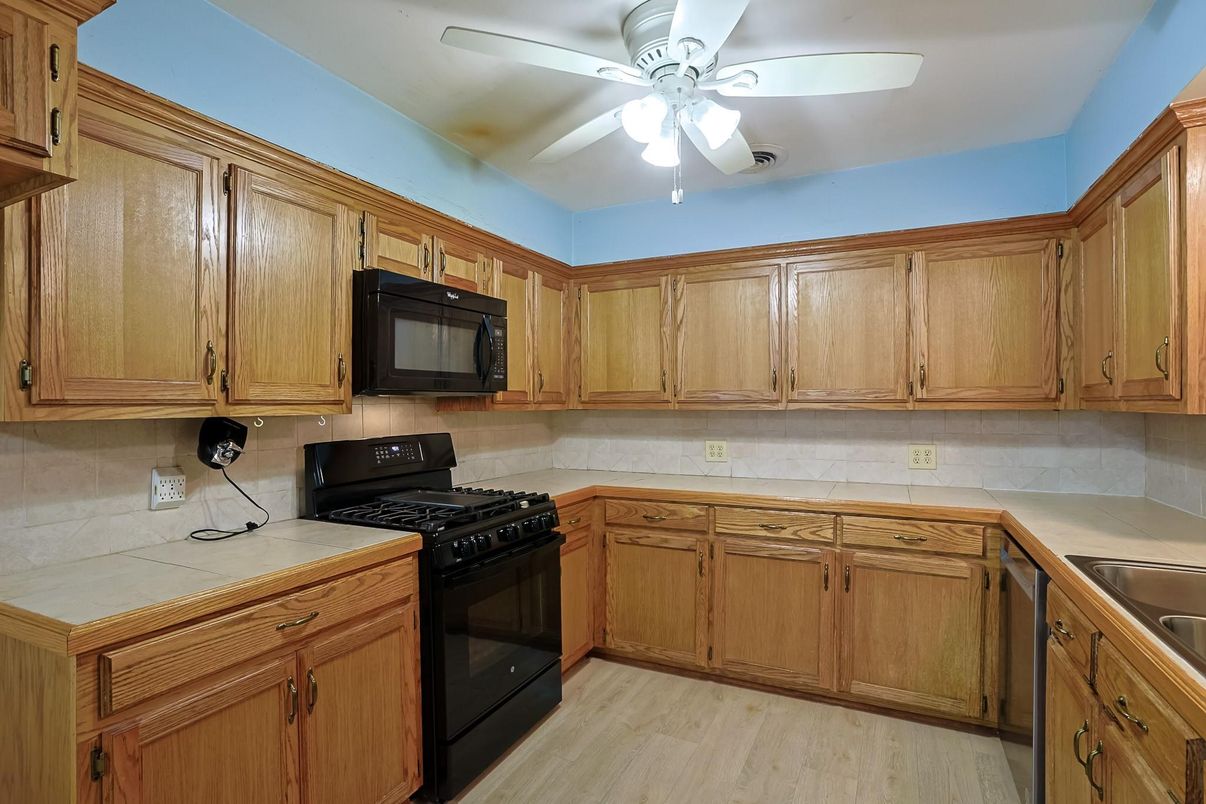 Interior, Kitchen, Tile Countertops, Wood Texture Flooring