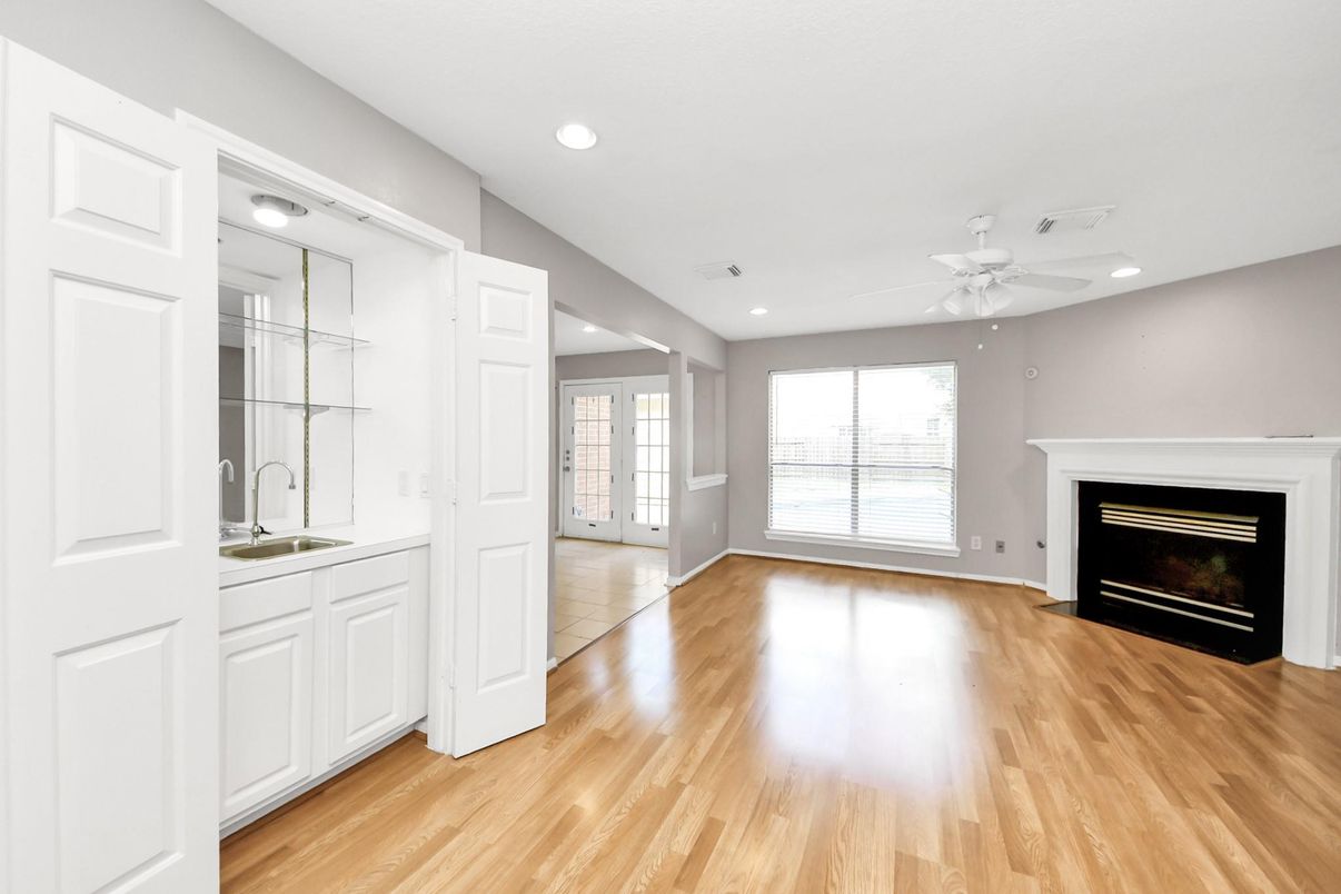 Empty room, Fireplace, Interior, Recessed Lighting, Wood Texture Flooring