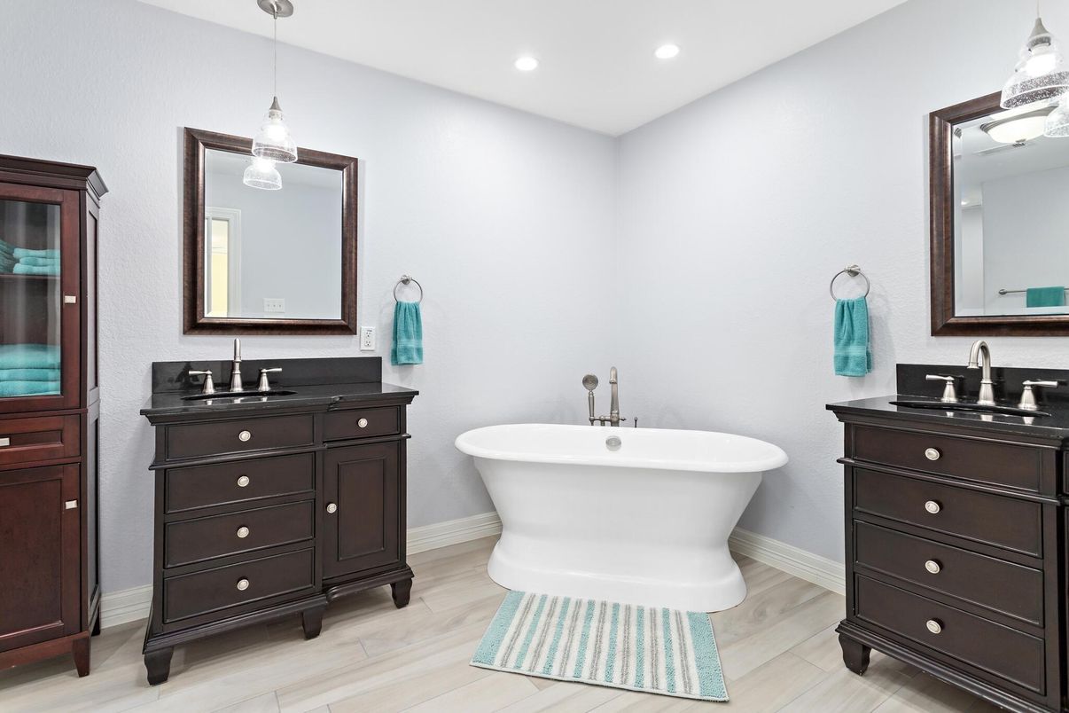 Bathroom, Dual Sink Vanities, Free Standing Baths, Interior, Pendant Lights, Recessed Lighting, Wood Texture Flooring