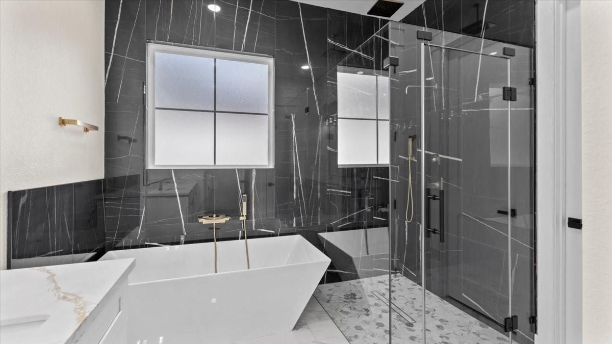 Bathroom, Free Standing Baths, Glass Shower, Interior, Marble, Marble Walls, Recessed Lighting