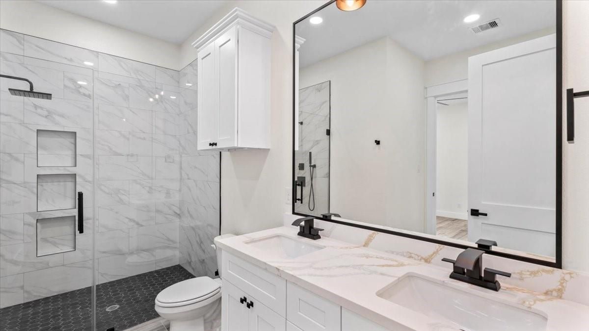 Bathroom, Dual Sink Vanities, Glass Shower, Interior, Marble Walls, Recessed Lighting