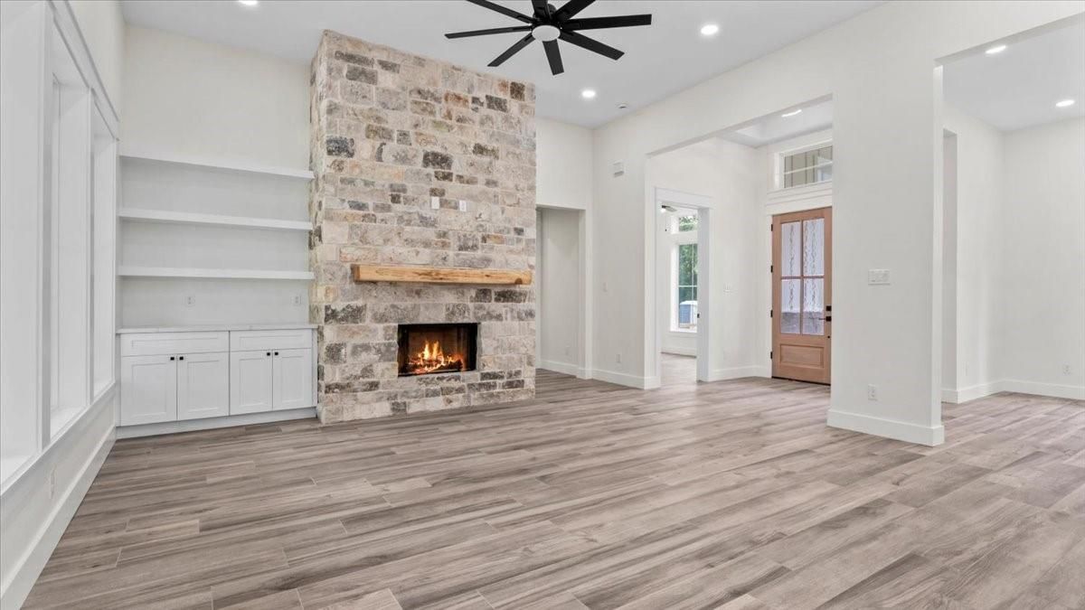 Empty room, Fireplace, Interior, Recessed Lighting, Wood Texture Flooring