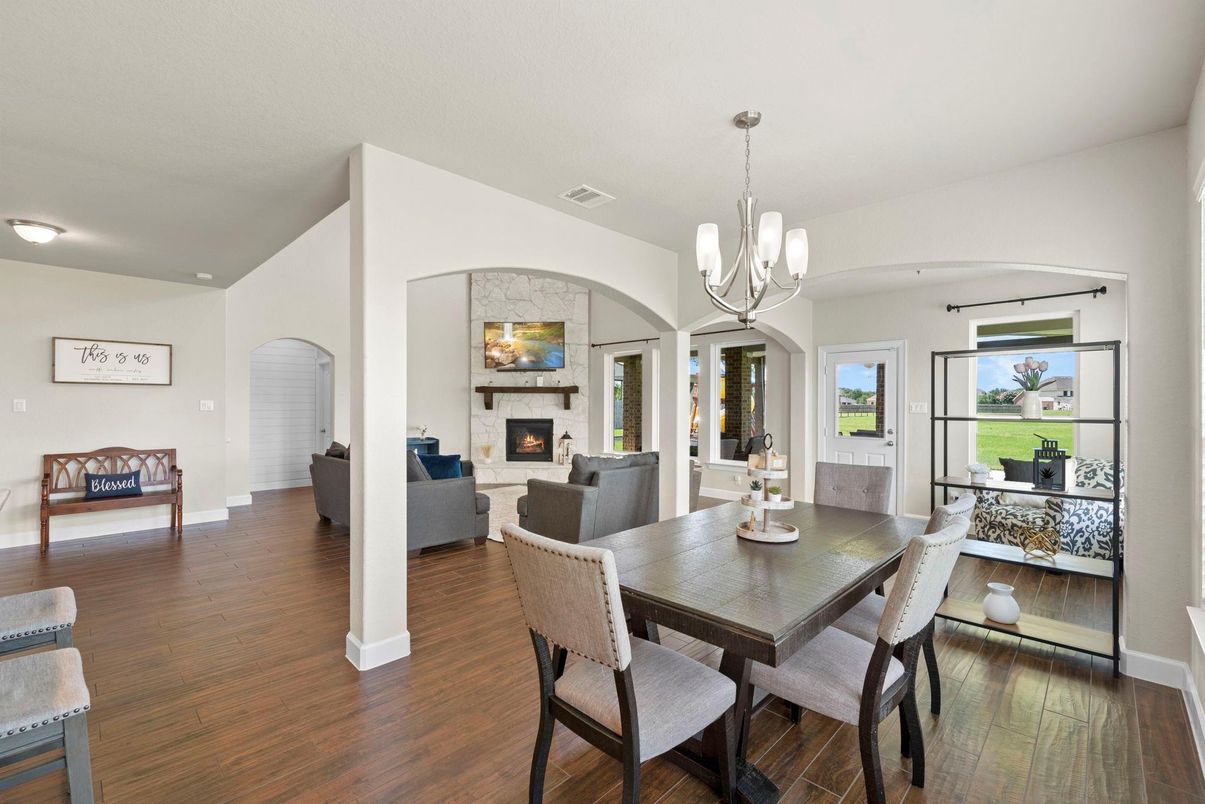 Chandelier, Dining room, Fireplace, Interior, Living room, Pendant Lights, Wood Texture Flooring