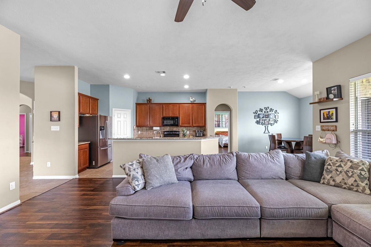 Dining room, Interior, Kitchen, Living room, Recessed Lighting, Stainless Steel Appliances, Wood Texture Flooring