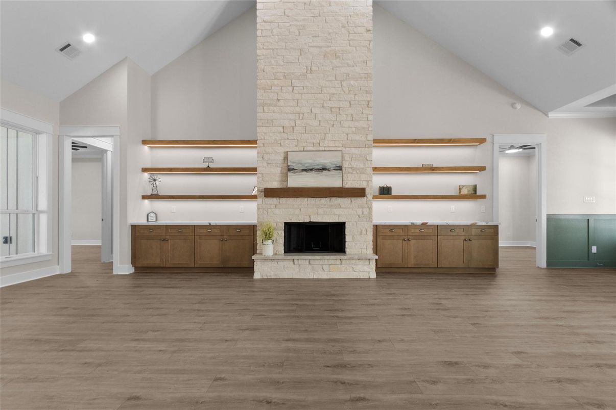 Empty room, Fireplace, Interior, Recessed Lighting, Stone Walls, Wood Texture Flooring