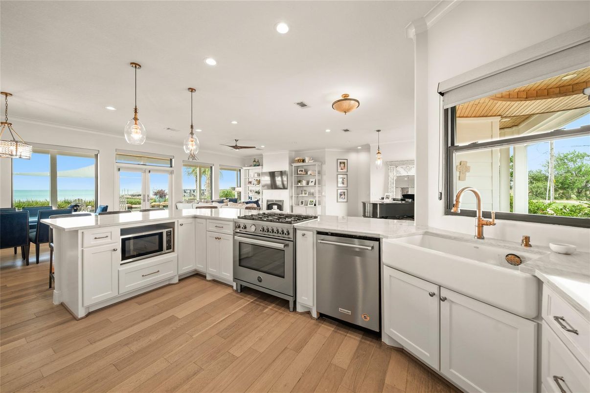 Interior, Kitchen, Pendant Lights, Recessed Lighting, Stainless Steel Appliances, Water, Wood Texture Flooring