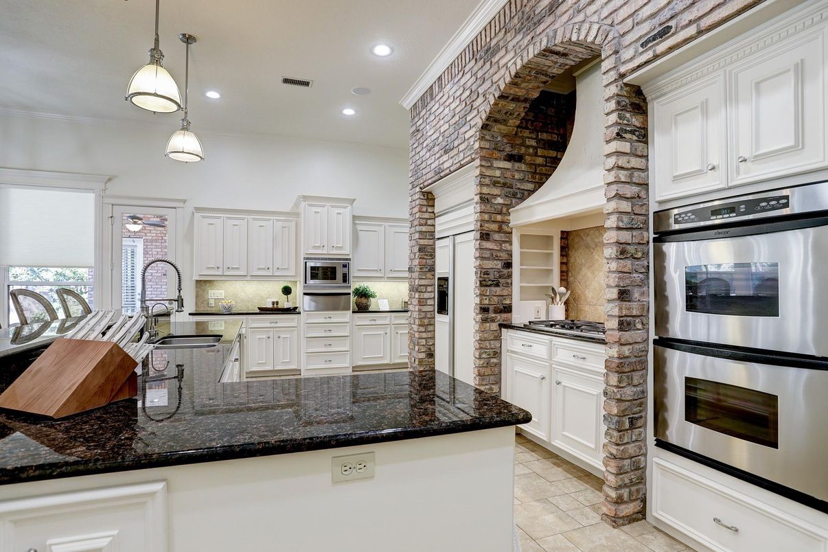 Interior, Kitchen, Pendant Lights, Recessed Lighting, Stainless Steel Appliances, Stone Walls