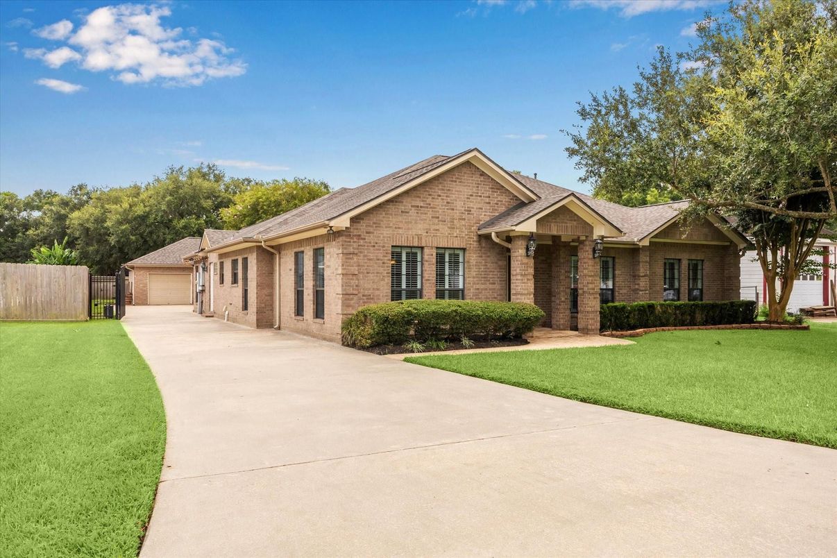Attached, Backyard, Detached Garage, Exterior, Facade, Brick Facade, Brick Traditional