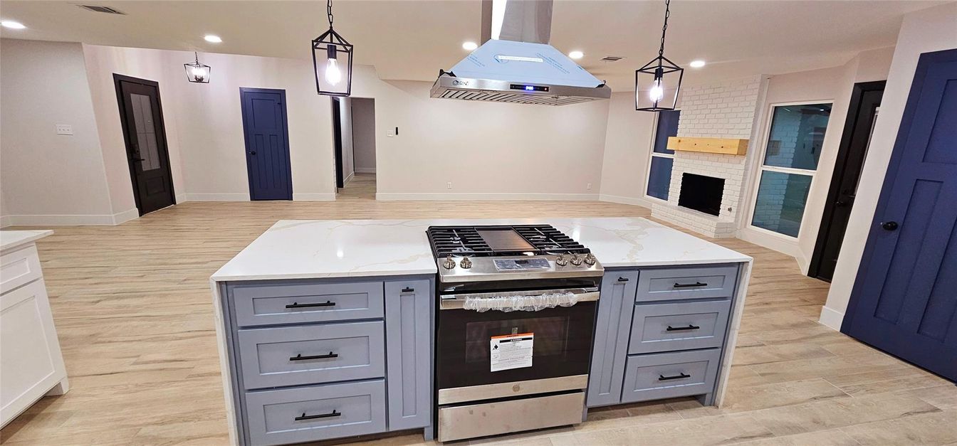 Fireplace, Interior, Kitchen, Pendant Lights, Recessed Lighting, Stainless Steel Appliances, Wood Texture Flooring