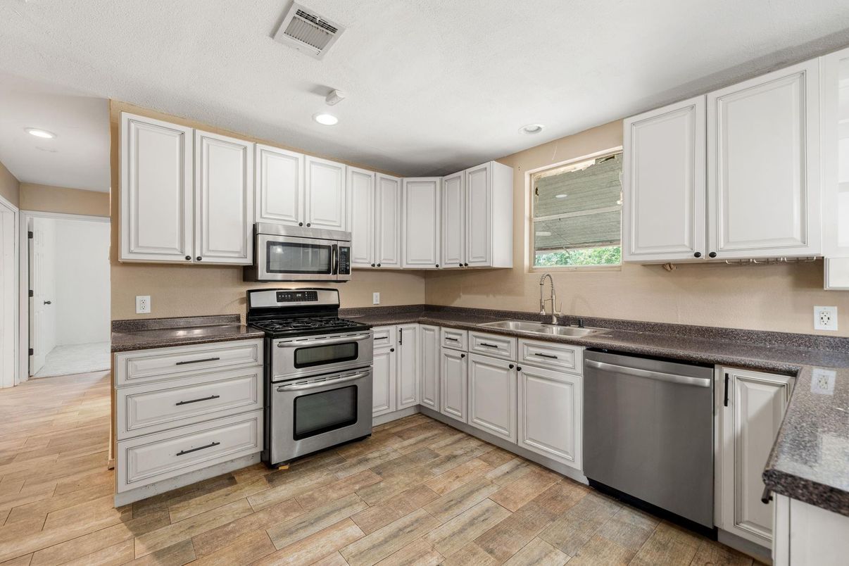 Interior, Kitchen, Recessed Lighting, Stainless Steel Appliances, Wood Texture Flooring