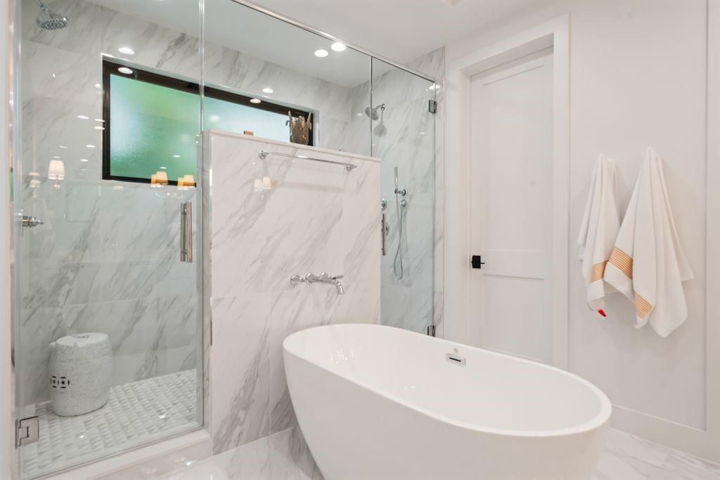 Bathroom, Free Standing Baths, Glass Shower, Interior, Marble, Marble Walls, Recessed Lighting