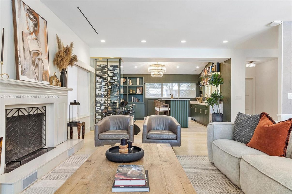 Chandelier, Fireplace, Interior, Living room, Recessed Lighting, Wine Storage, Wood Texture Flooring