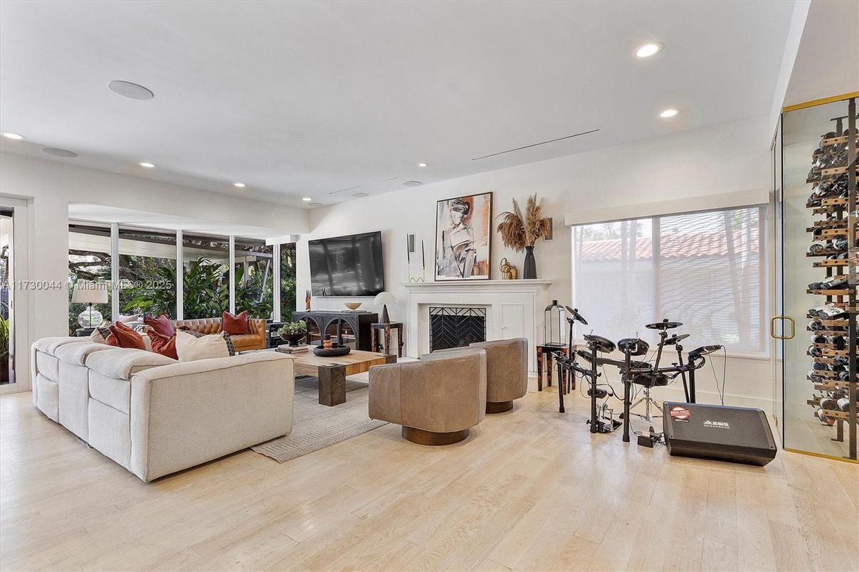 Fireplace, Fitness Equipment, Interior, Living room, Recessed Lighting, Wood Texture Flooring