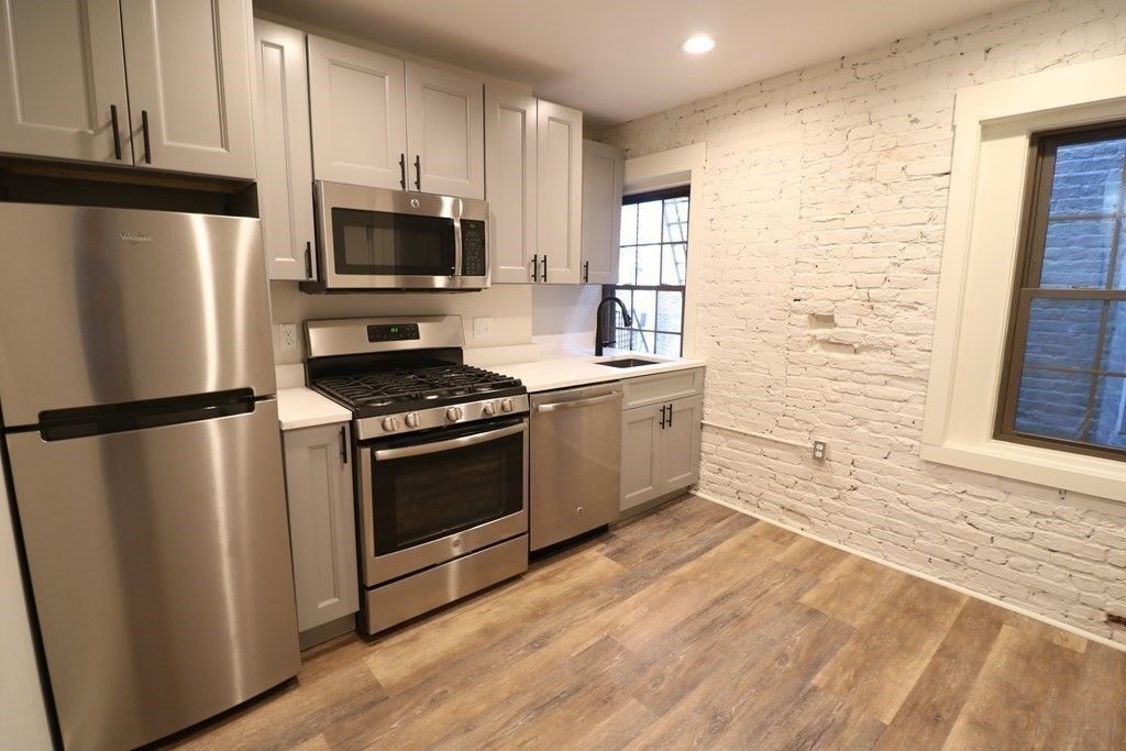 Interior, Kitchen, Recessed Lighting, Stainless Steel Appliances, Stone Walls, Wood Texture Flooring