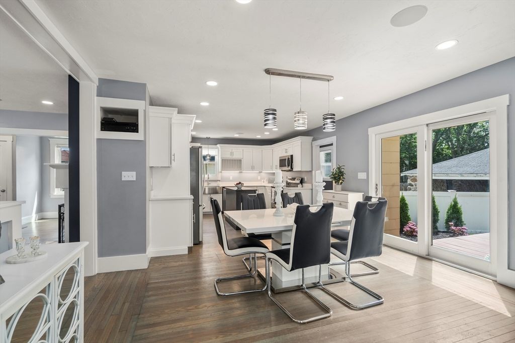 Dining room, Interior, Kitchen, Pendant Lights, Recessed Lighting, Stainless Steel Appliances, Wood Texture Flooring