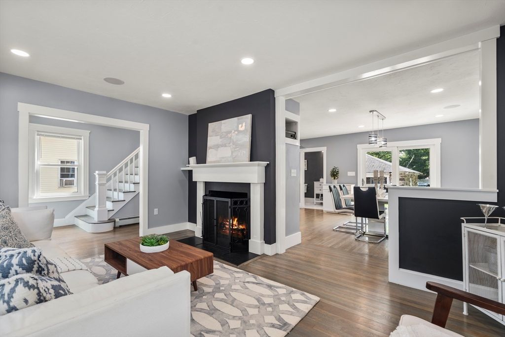 Dining room, Fireplace, Interior, Living room, Pendant Lights, Recessed Lighting, Wood Texture Flooring
