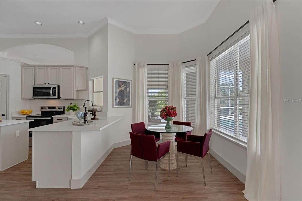 Dining room, Interior, Kitchen, Recessed Lighting, Stainless Steel Appliances, Wood Texture Flooring