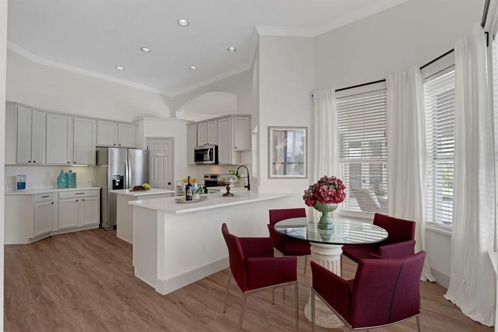 Dining room, Interior, Kitchen, Recessed Lighting, Stainless Steel Appliances, Wood Texture Flooring