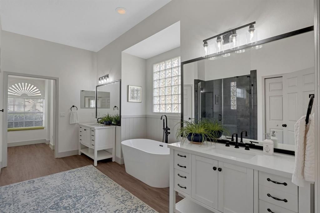 Bathroom, Dual Sink Vanities, Free Standing Baths, Interior, Recessed Lighting, Wood Texture Flooring