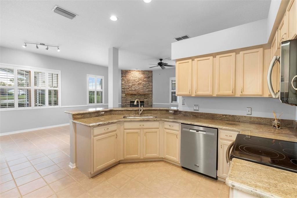 Fireplace, Interior, Kitchen, Recessed Lighting, Stone Walls