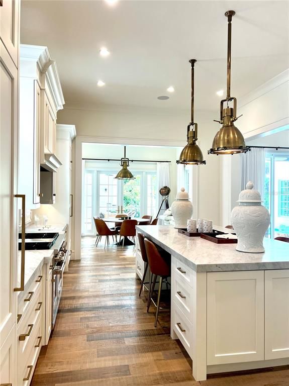 Dining room, Interior, Kitchen, Pendant Lights, Recessed Lighting, Stainless Steel Appliances, Wood Texture Flooring