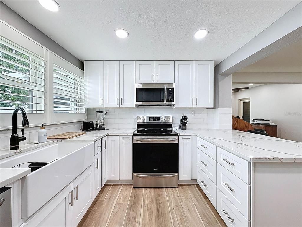 Interior, Kitchen, Recessed Lighting, Stainless Steel Appliances, Wood Texture Flooring