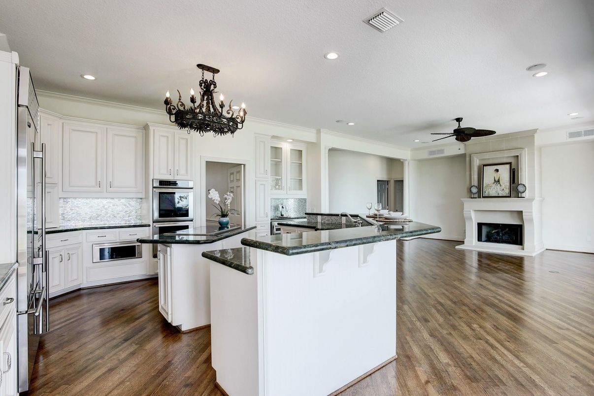 Chandelier, Fireplace, Interior, Kitchen, Recessed Lighting, Wood Texture Flooring