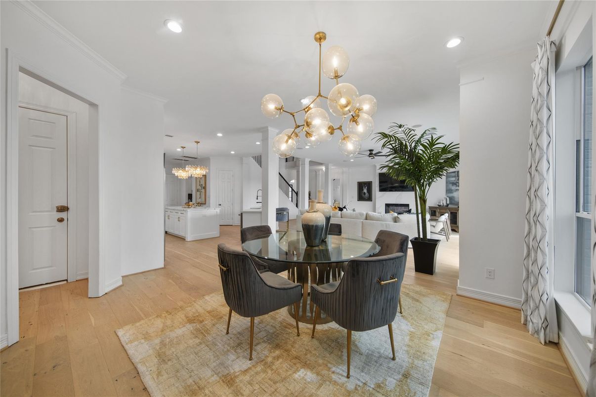 Dining room, Fireplace, Interior, Living room, Pendant Lights, Recessed Lighting, Wood Texture Flooring