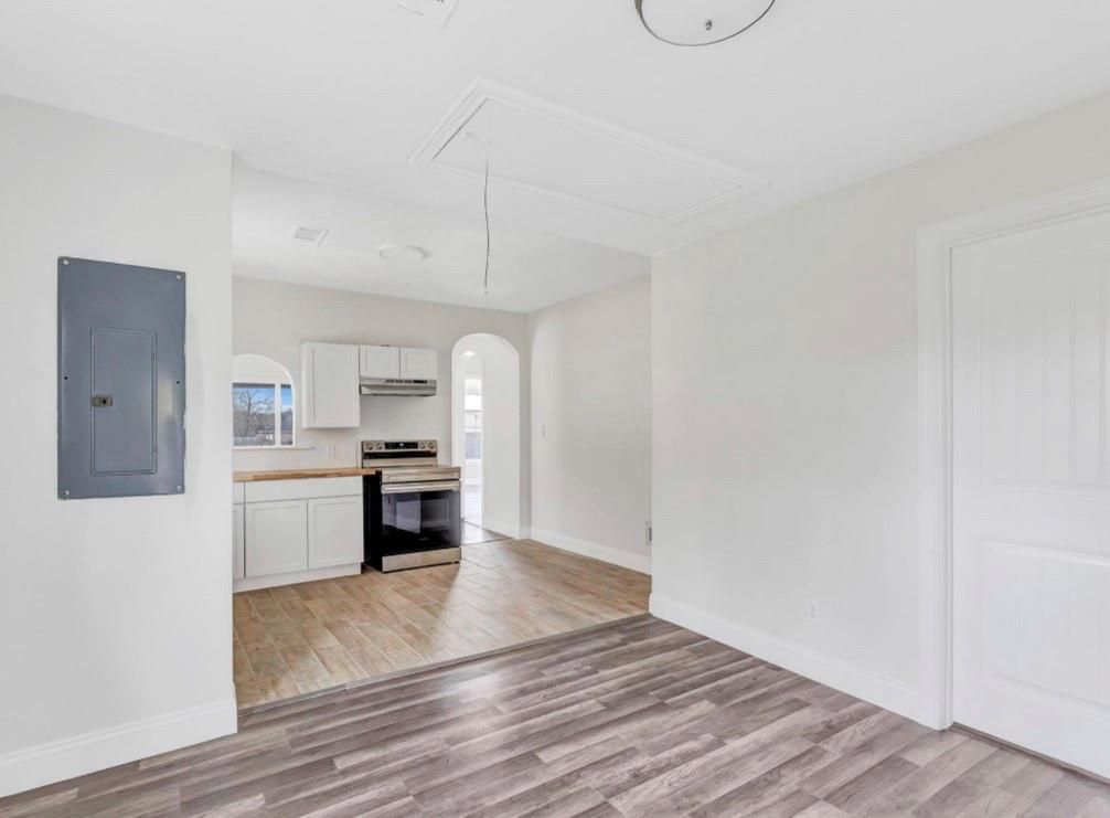 Empty room, Interior, Kitchen, Stainless Steel Appliances, Wood Texture Flooring
