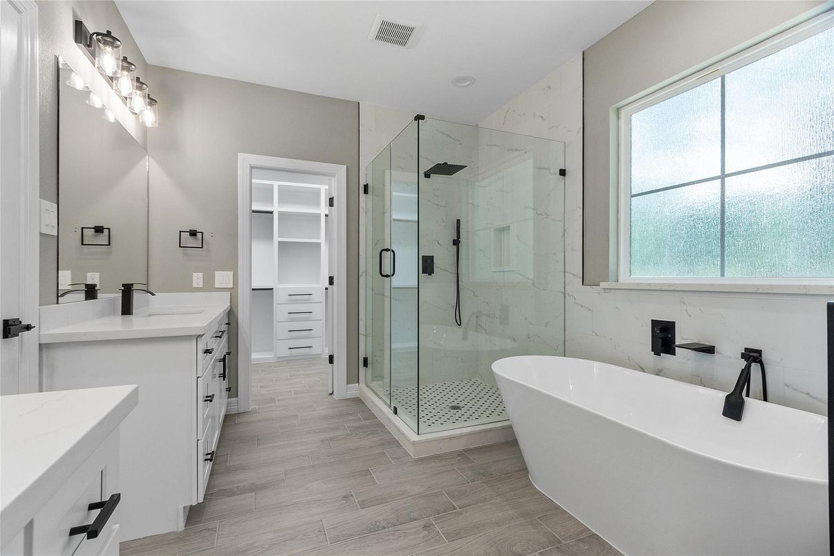 Bathroom, Dual Sink Vanities, Free Standing Baths, Glass Shower, Interior, Marble Walls, Wood Texture Flooring