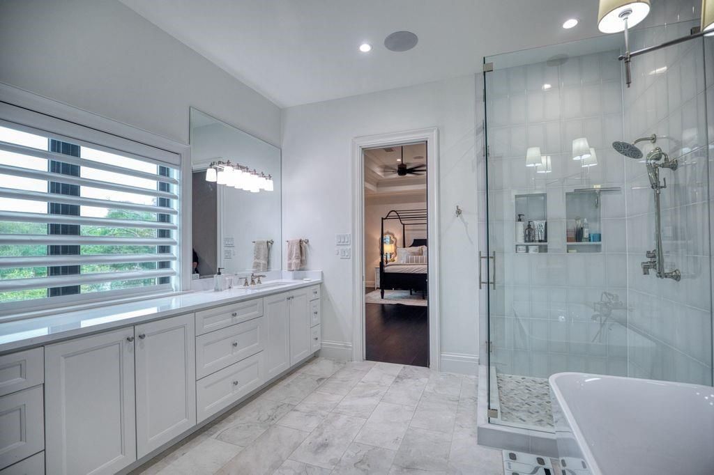 Bathroom, Bedroom, Dual Sink Vanities, Glass Shower, Interior, Marble, Recessed Lighting, Wood Texture Flooring