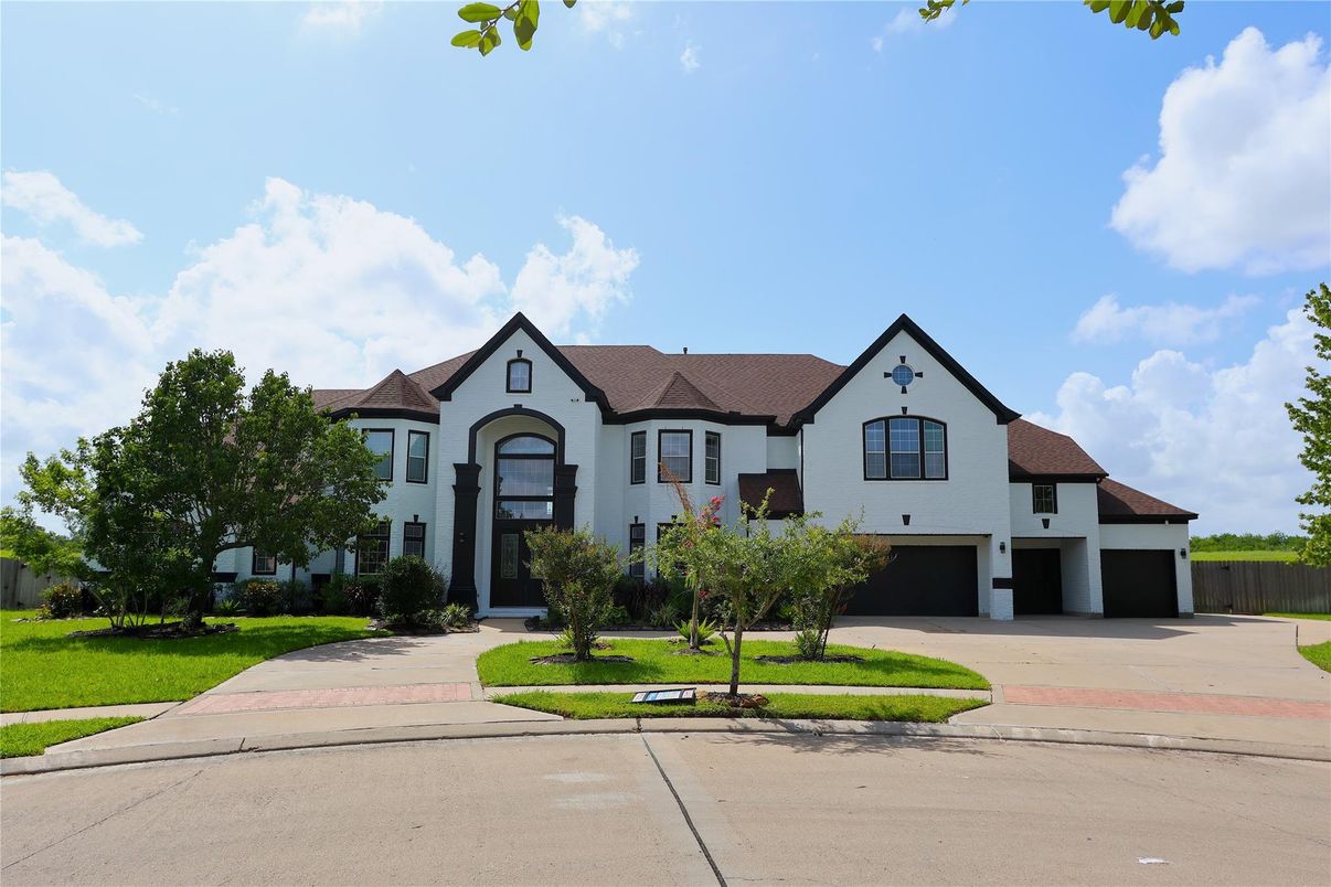 Attached, Exterior, Facade, Tudor Revival