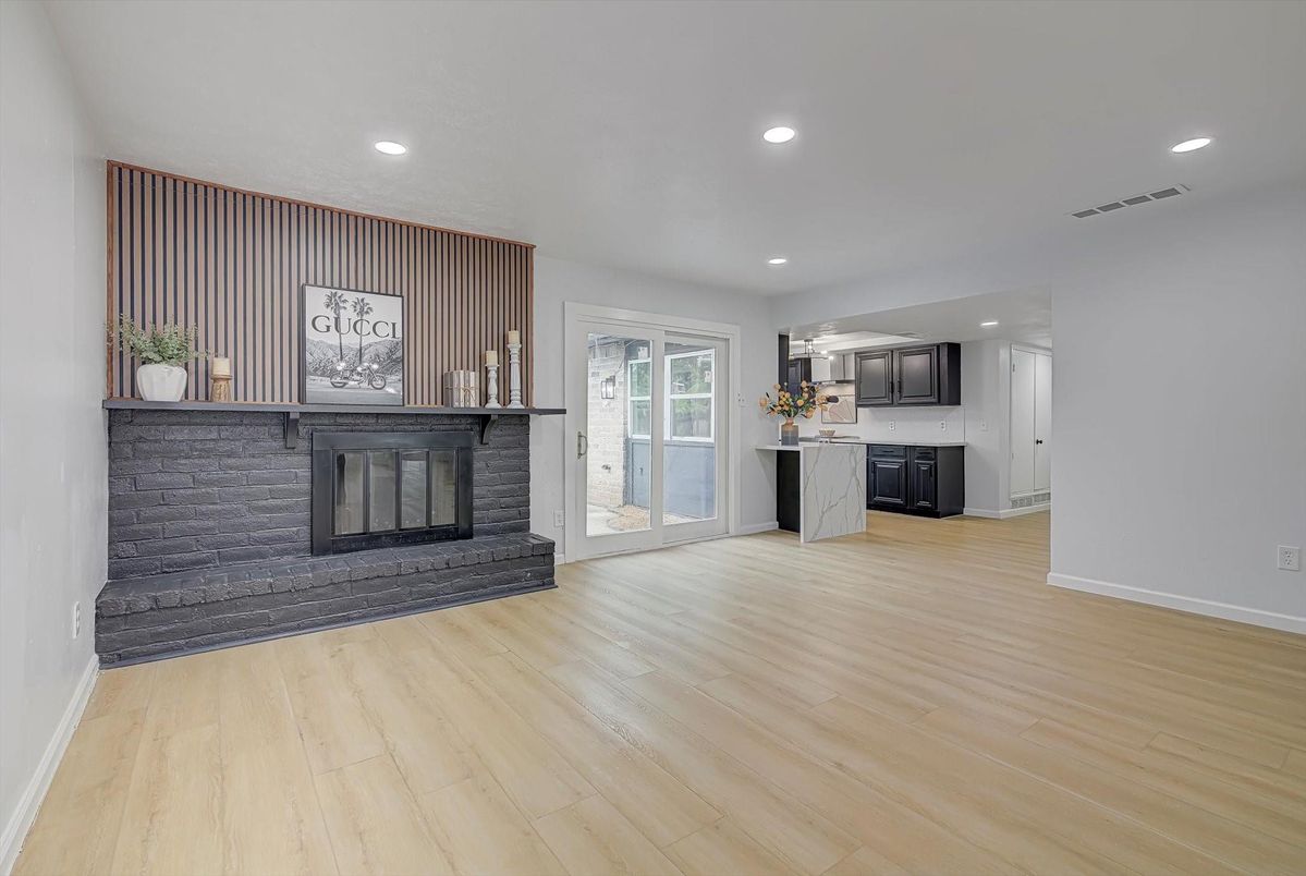 Fireplace, Interior, Kitchen, Recessed Lighting, Wood Texture Flooring