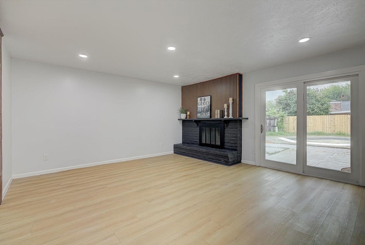 Empty room, Fireplace, Interior, Recessed Lighting, Wood Texture Flooring