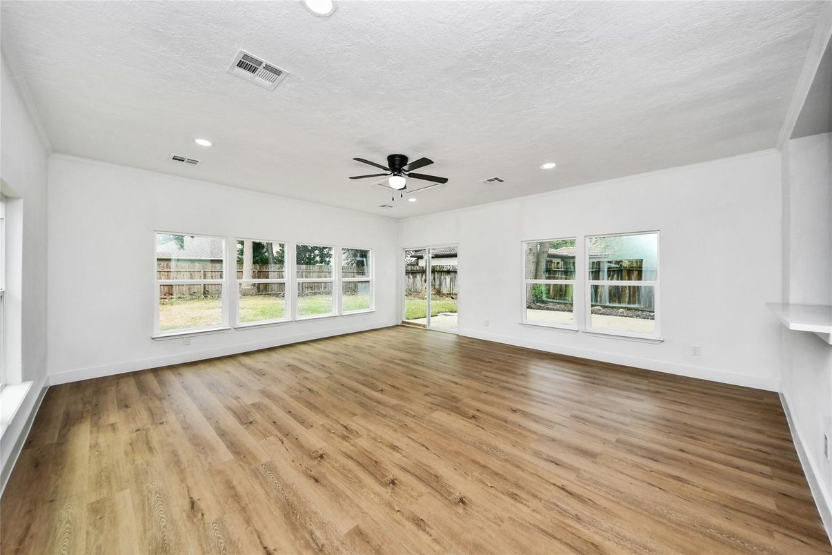 Empty room, Fireplace, Interior, Recessed Lighting, Wood Texture Flooring