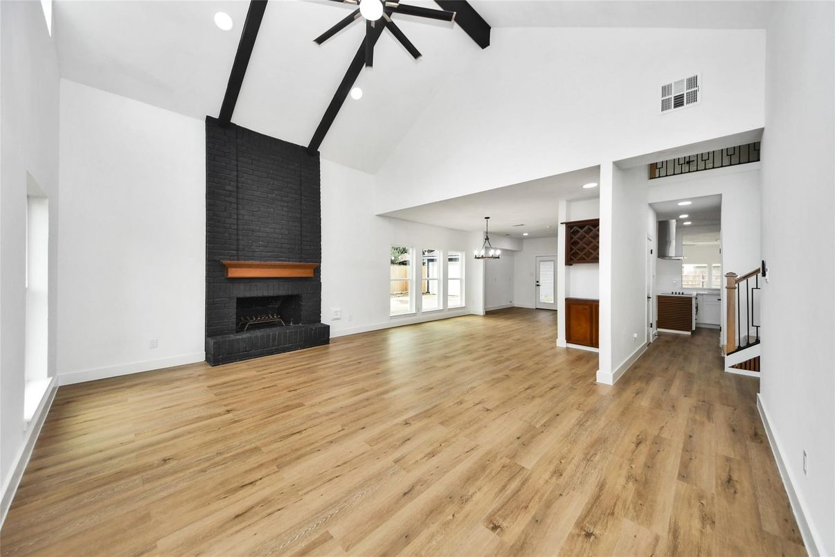 Empty room, Fireplace, Interior, Pendant Lights, Recessed Lighting, Wood Texture Flooring
