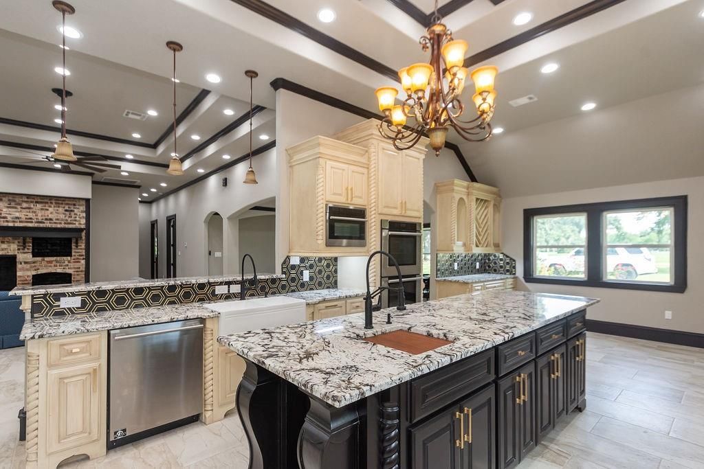 Chandelier, Interior, Kitchen, Pendant Lights, Recessed Lighting, Stainless Steel Appliances, Stone Walls, Wood Texture Flooring
