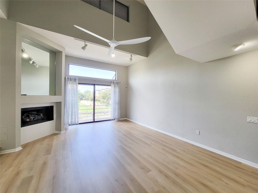 Empty room, Fireplace, Interior, Recessed Lighting, Wood Texture Flooring