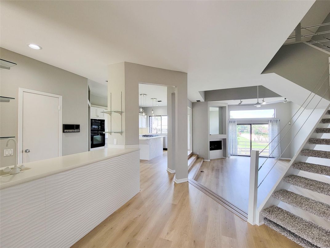 Fireplace, Interior, Kitchen, Recessed Lighting, Wood Texture Flooring