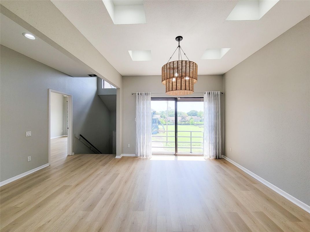 Chandelier, Empty room, Interior, Recessed Lighting, Wood Texture Flooring