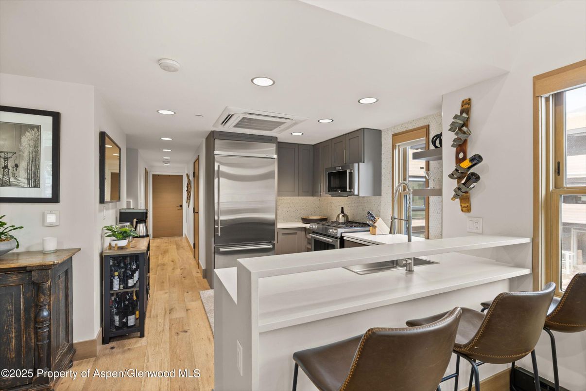 Interior, Kitchen, Recessed Lighting, Stainless Steel Appliances, Wood Texture Flooring