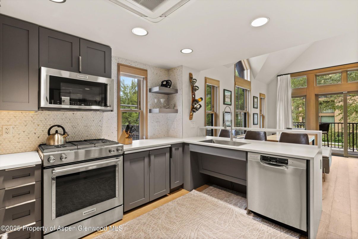 Interior, Kitchen, Recessed Lighting, Stainless Steel Appliances, Wood Texture Flooring